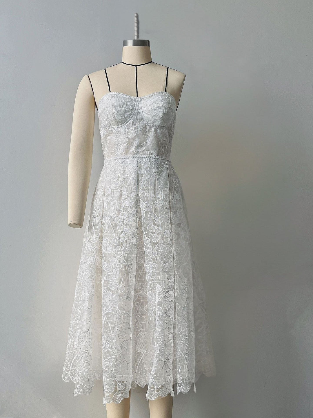 Rosalie strapless midi dress with a shiny floral embroidery design