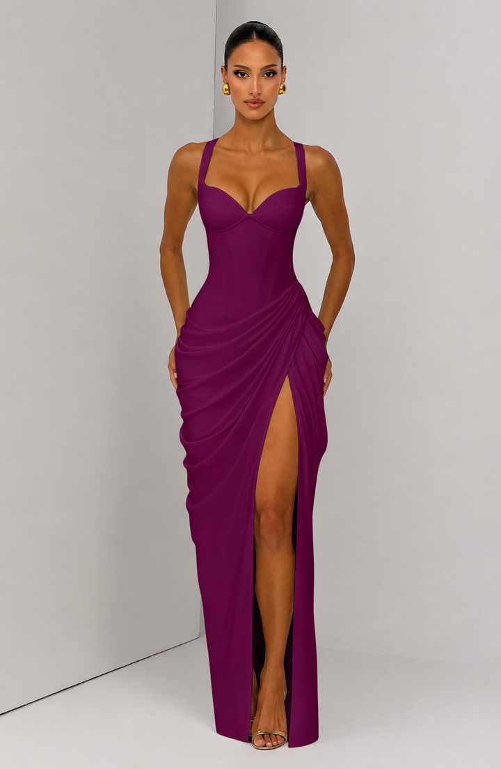 Layla maxi dress with a slit, pleats, corset design, back tie, and waist-cinching fit