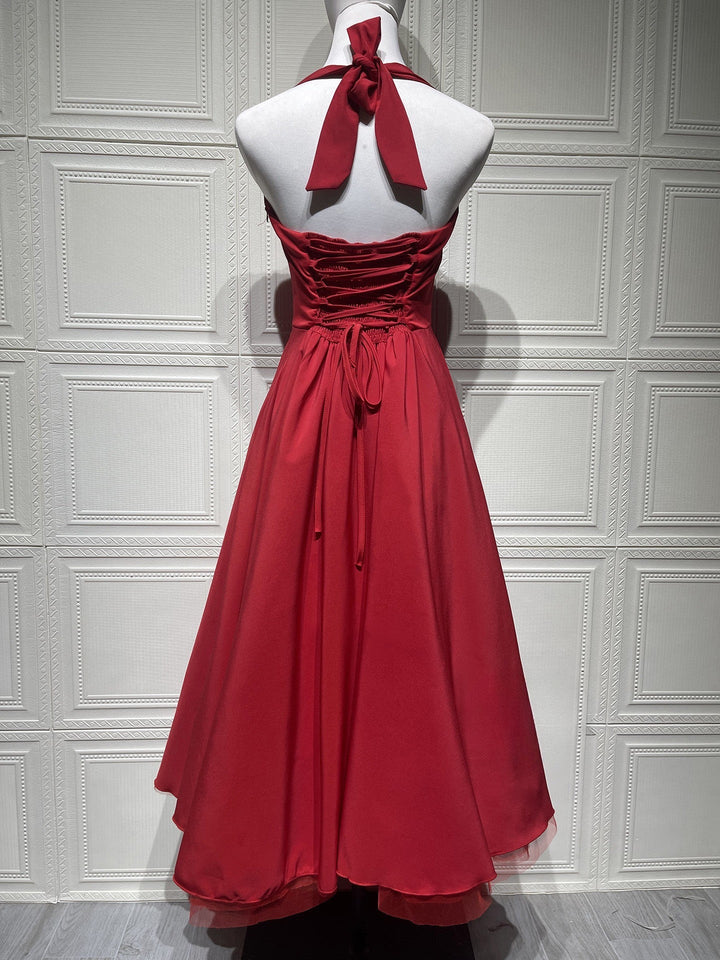 Marlene midi dress with a neck tie, open back, and tulle trim