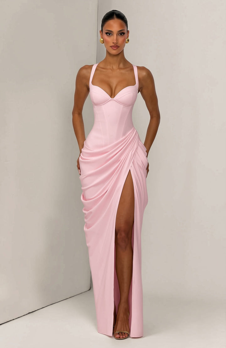 Layla maxi dress with a slit, pleats, corset design, back tie, and waist-cinching fit
