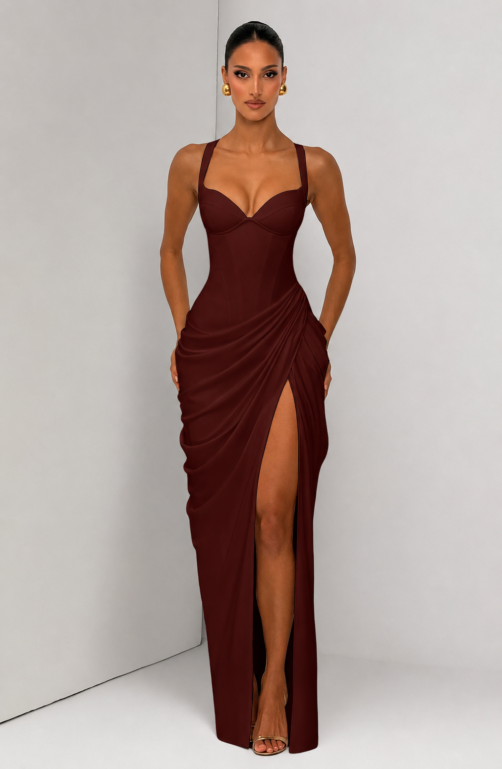 Layla maxi dress with a slit, pleats, corset design, back tie, and waist-cinching fit