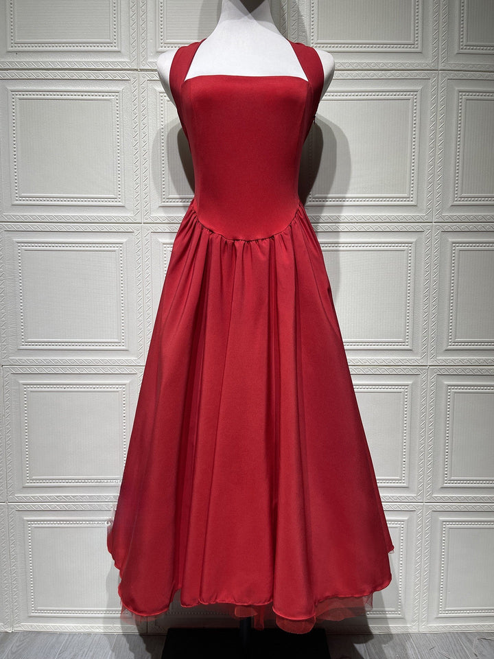 Marlene midi dress with a neck tie, open back, and tulle trim