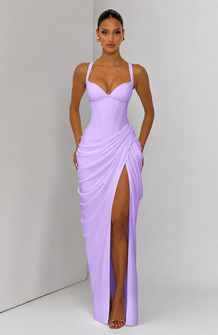 Layla maxi dress with a slit, pleats, corset design, back tie, and waist-cinching fit