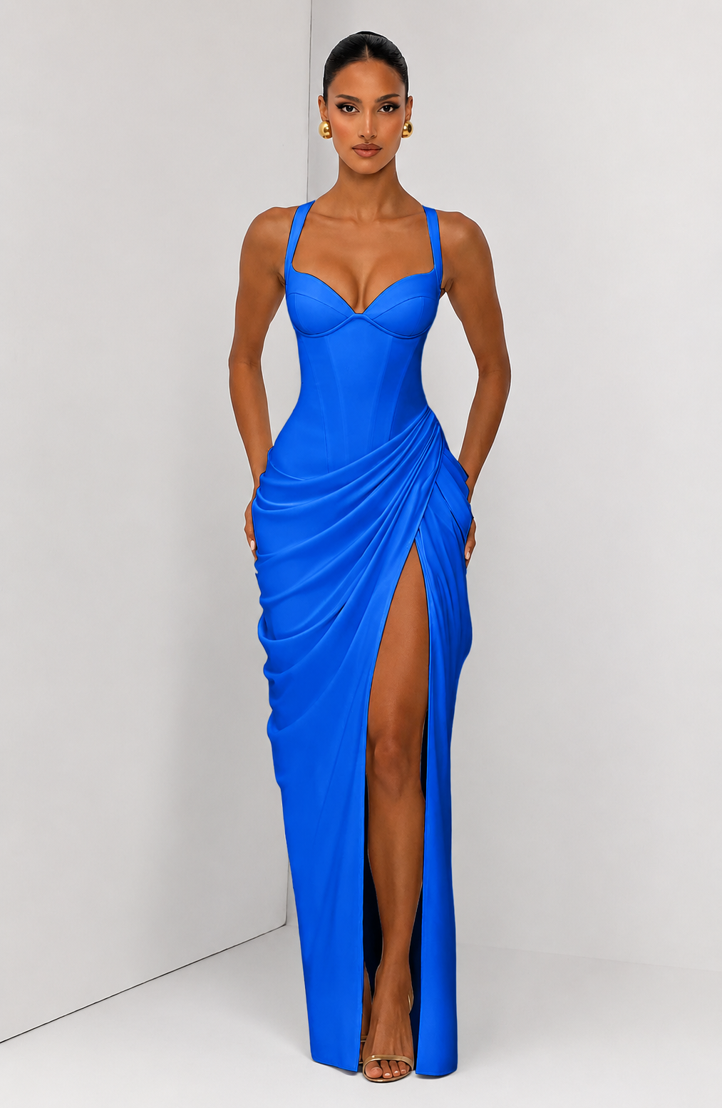 Layla maxi dress with a slit, pleats, corset design, back tie, and waist-cinching fit