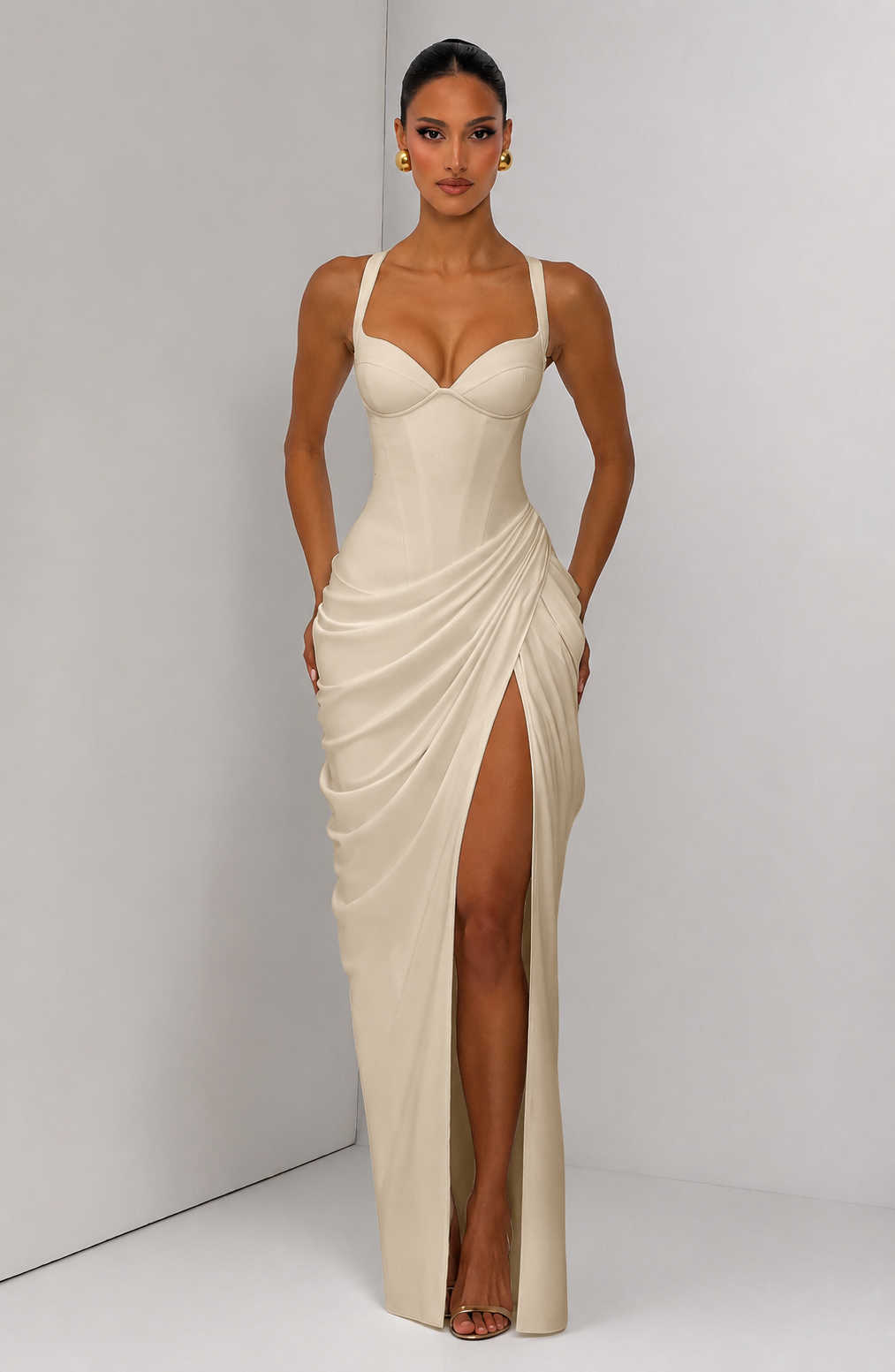 Layla maxi dress with a slit, pleats, corset design, back tie, and waist-cinching fit