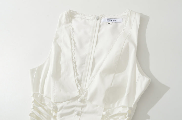 A-line mini dress with tie and button embellishments – Vanessa