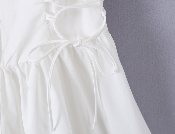 A-line mini dress with tie and button embellishments – Vanessa