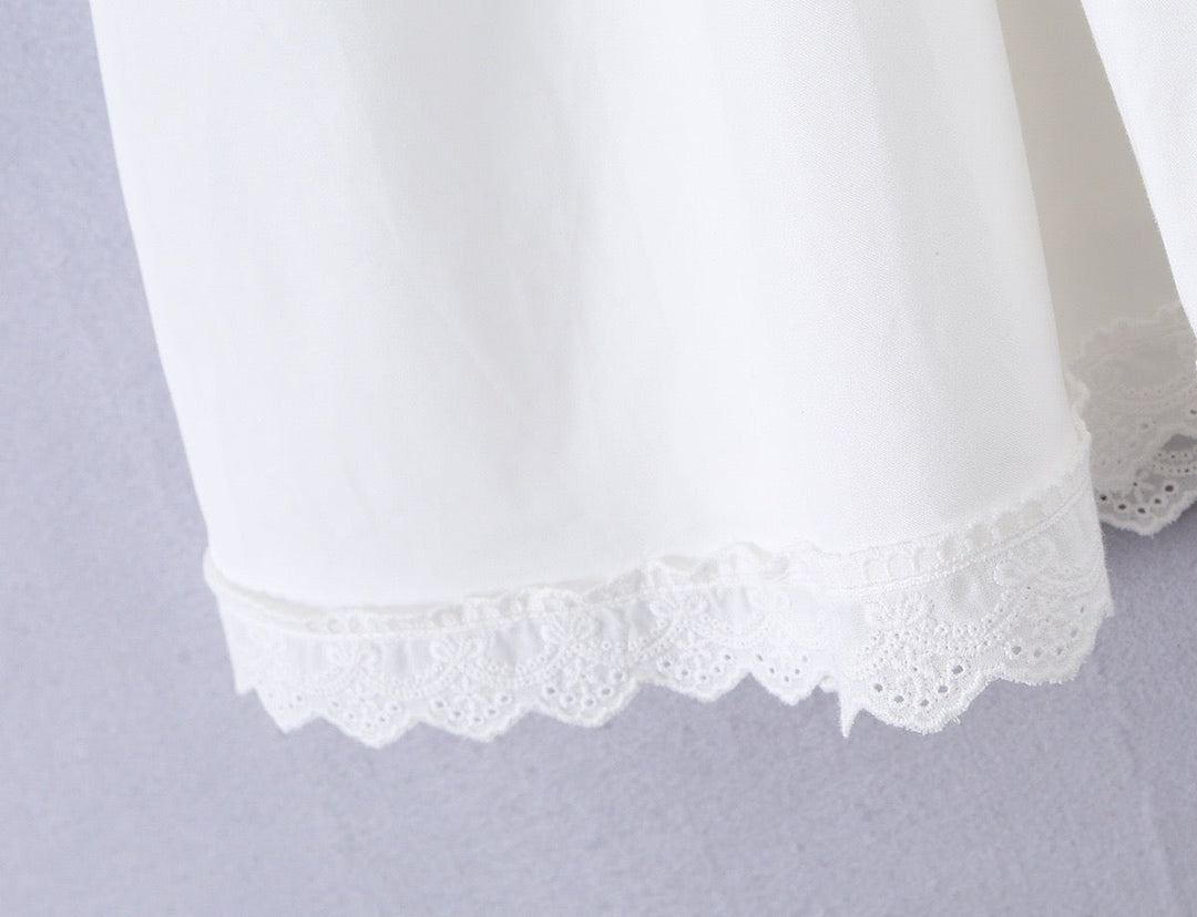 A-line mini dress with tie and button embellishments – Vanessa