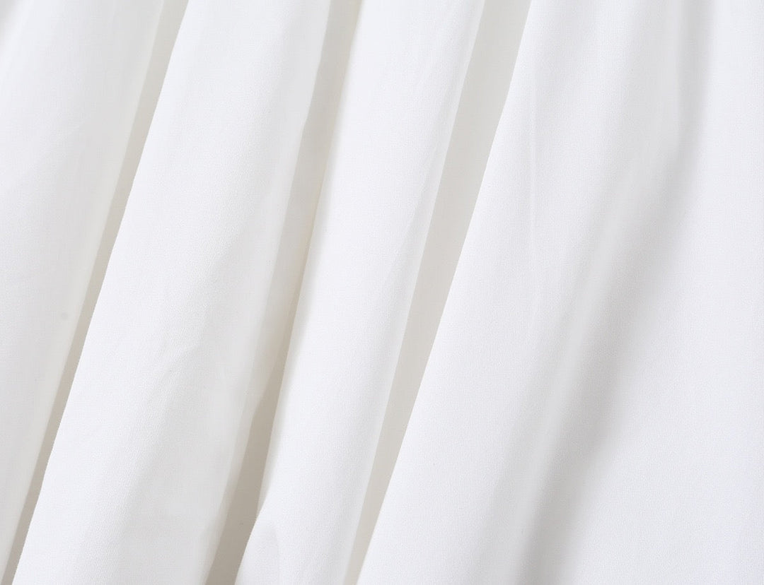 A-line mini dress with tie and button embellishments – Vanessa