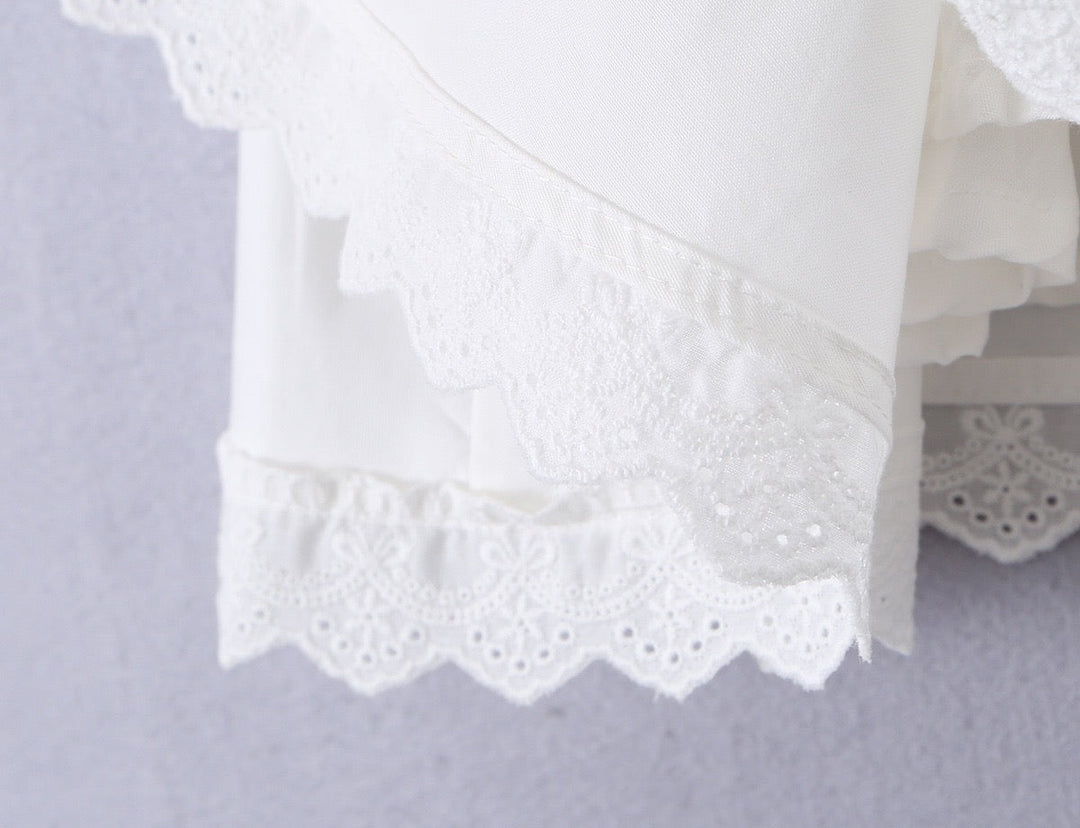A-line mini dress with tie and button embellishments – Vanessa