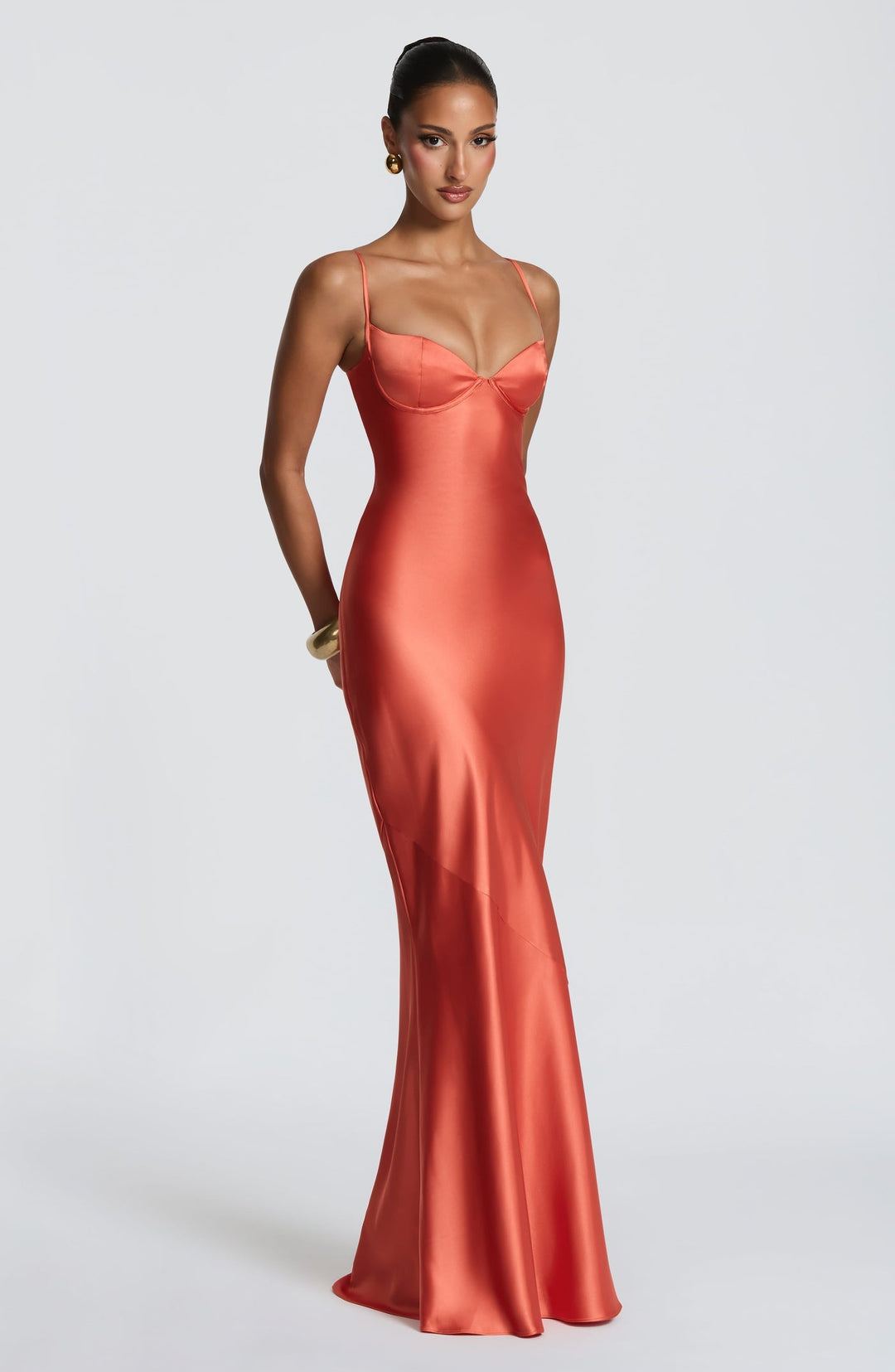 Alaia satin maxi dress with a back tie and waist-cinching design