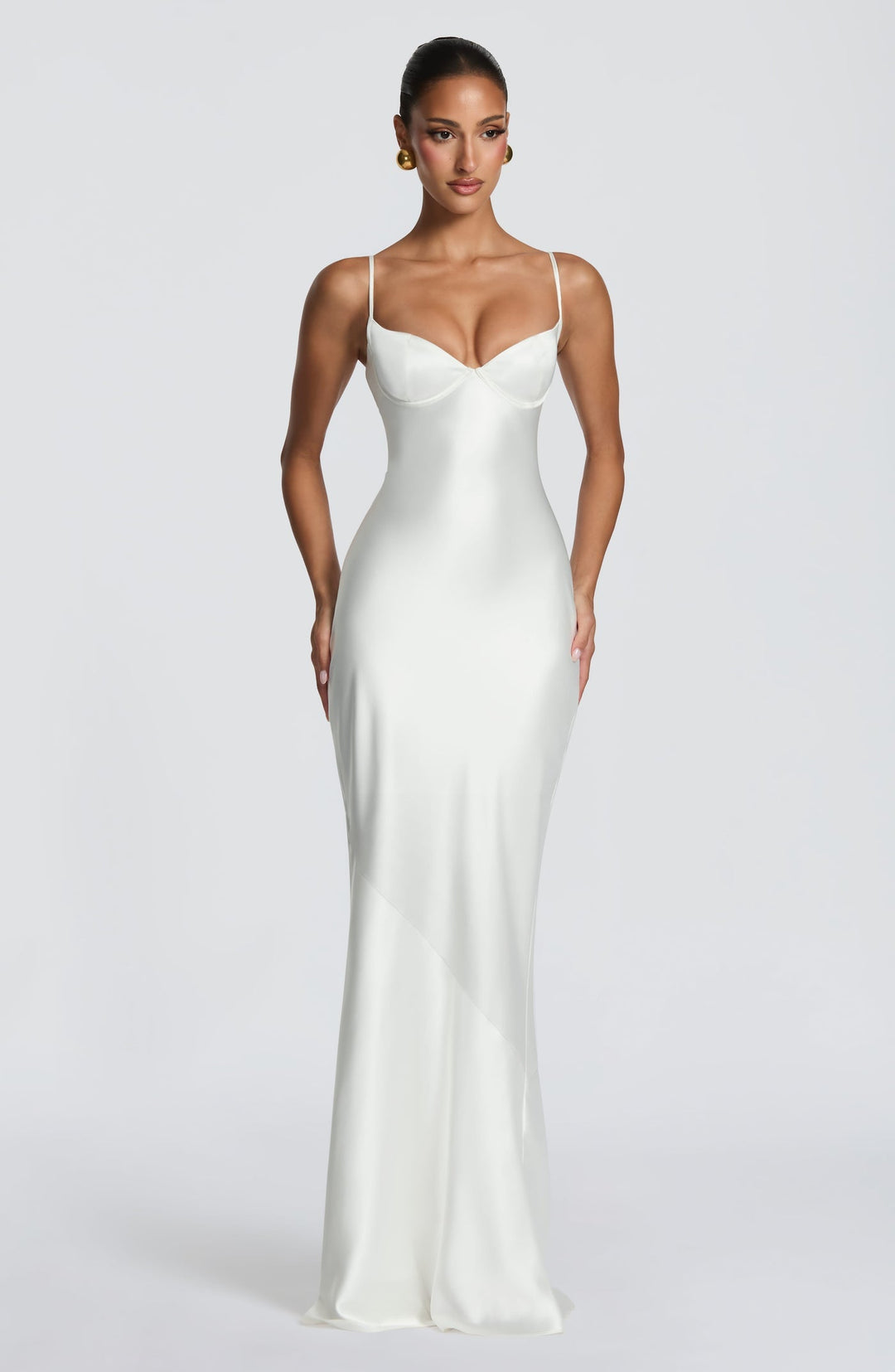 Alaia satin maxi dress with a back tie and waist-cinching design
