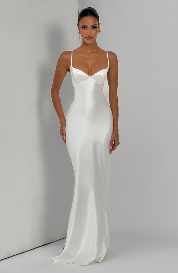 Alaia satin maxi dress with a back tie and waist-cinching design