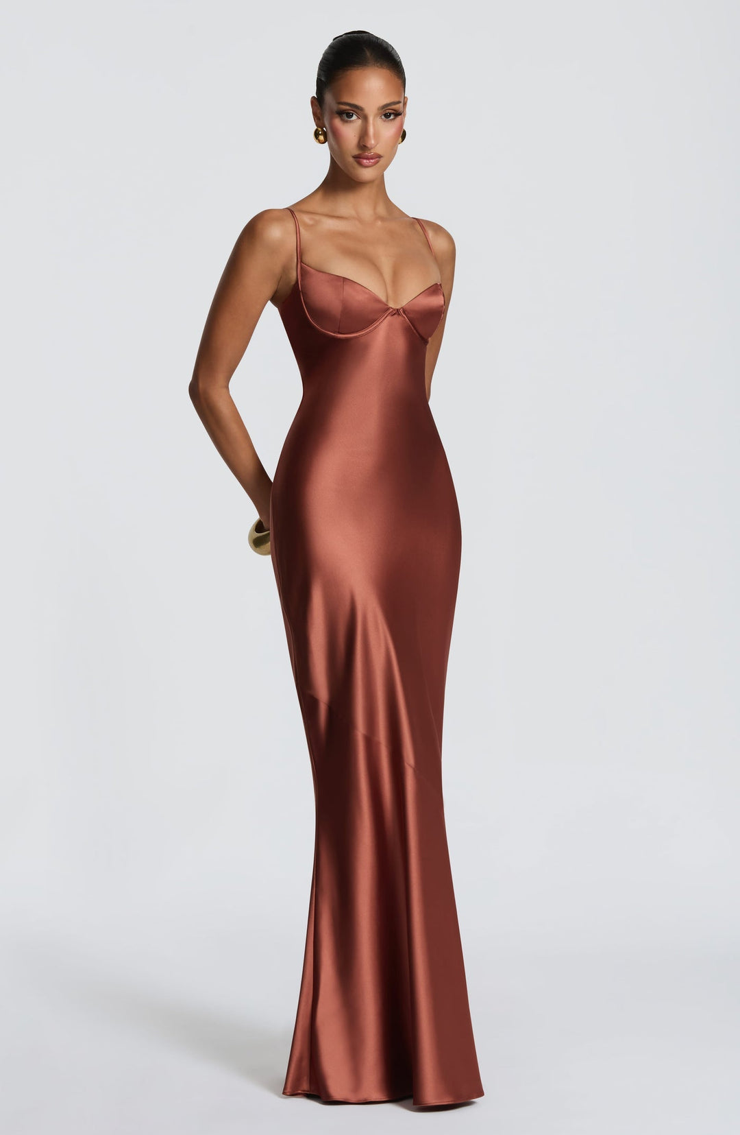 Alaia satin maxi dress with a back tie and waist-cinching design