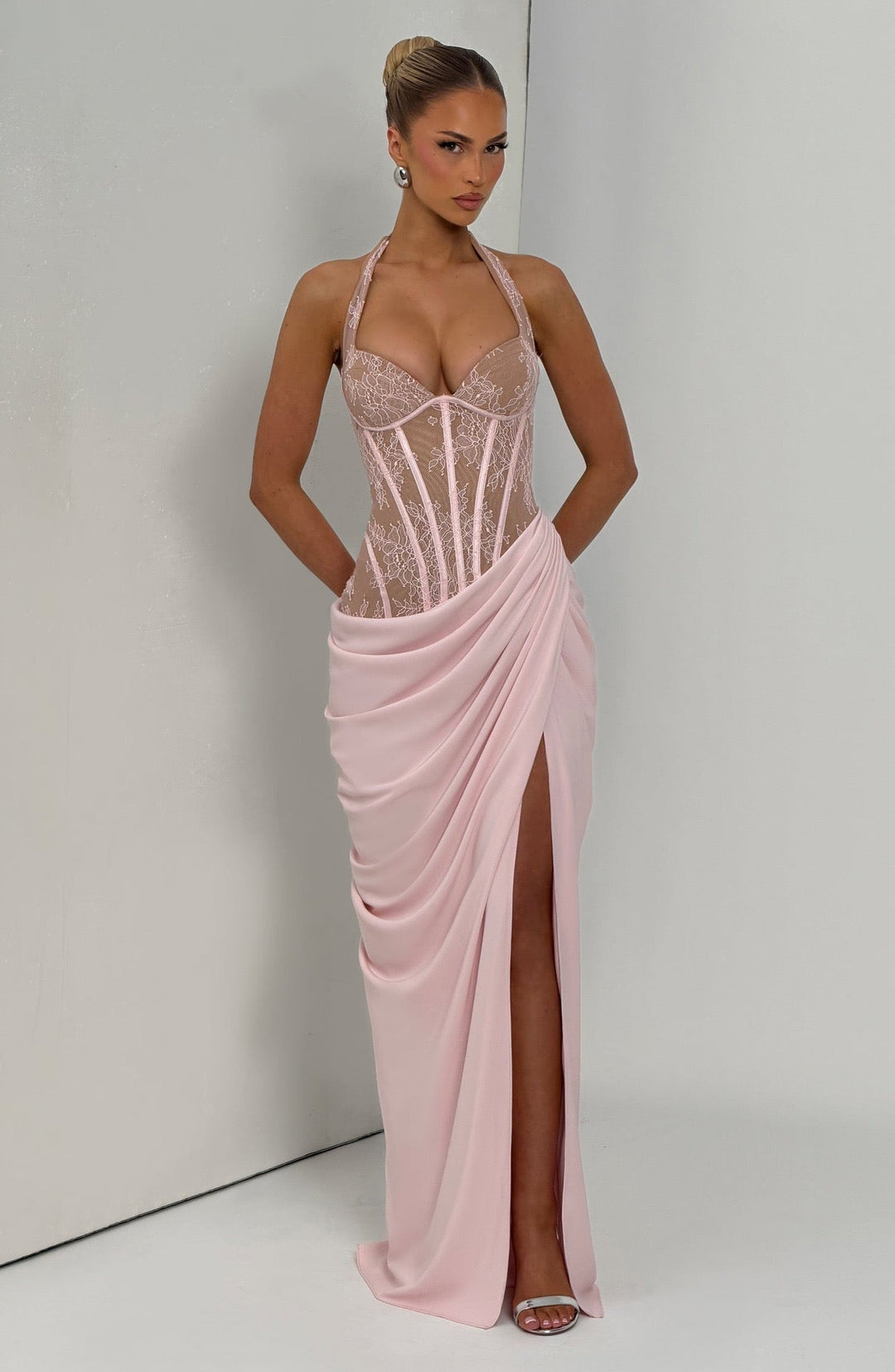 Elegant pleated maxi dress with lace embellishments, a slit design, and a back tie for a cinched waist – AYLIN