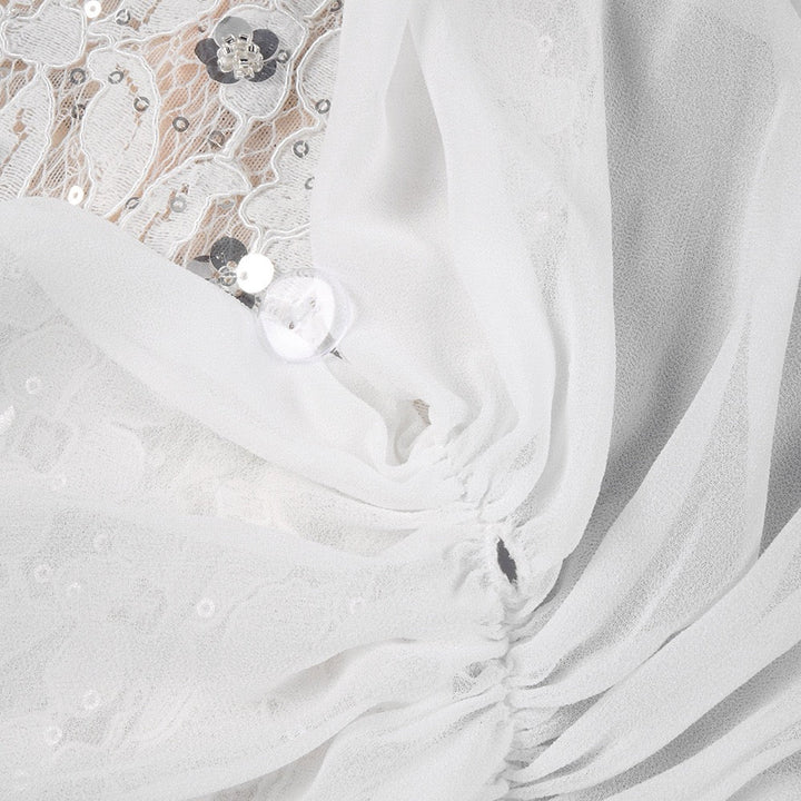 Lace mini dress with sequin and rhinestone embellishments and a chiffon train - MAXIMA