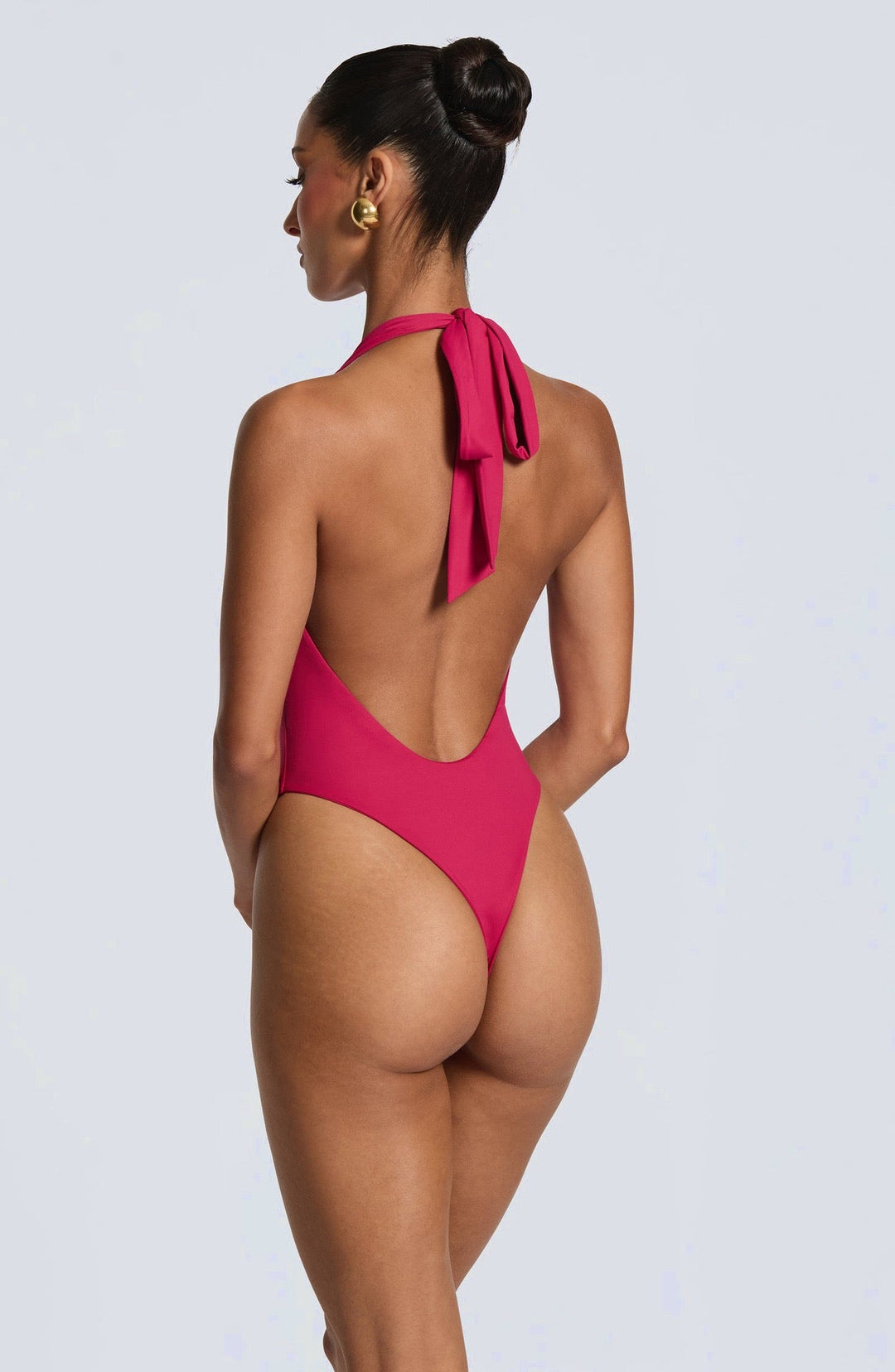 Lorenza - Two-piece set with a halter-tie bodysuit, open back, and asymmetrical skirt