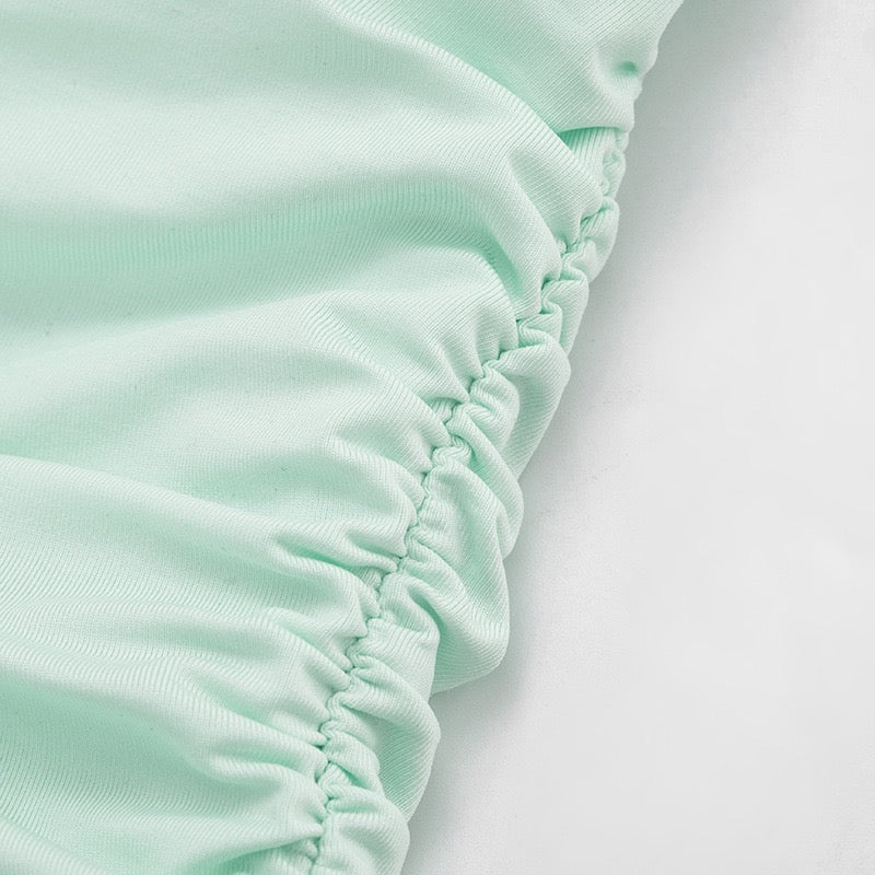 Ruched mini dress with chiffon overlay embellishments – Lily