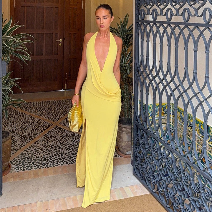 Maxi dress with a slit, pleats, neck tie, and open back – Penelope