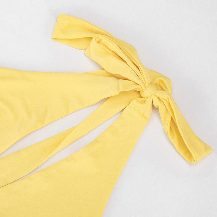 Maxi dress with a slit, pleats, neck tie, and open back – Penelope