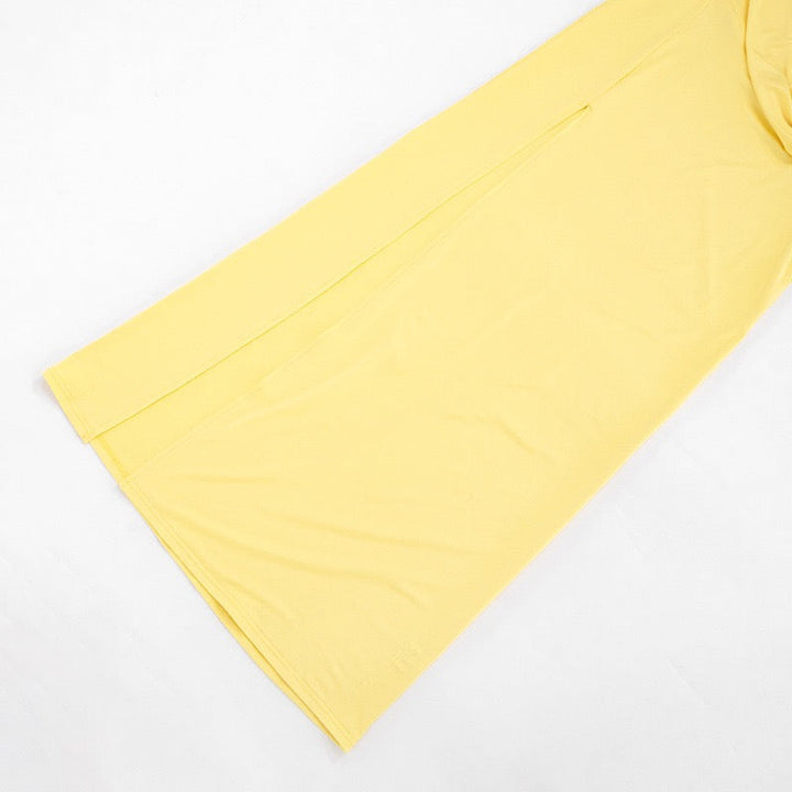 Maxi dress with a slit, pleats, neck tie, and open back – Penelope