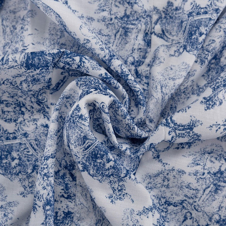Mini dress with illustrated embellishments, embroidery, and pearl buttons – Alexandra