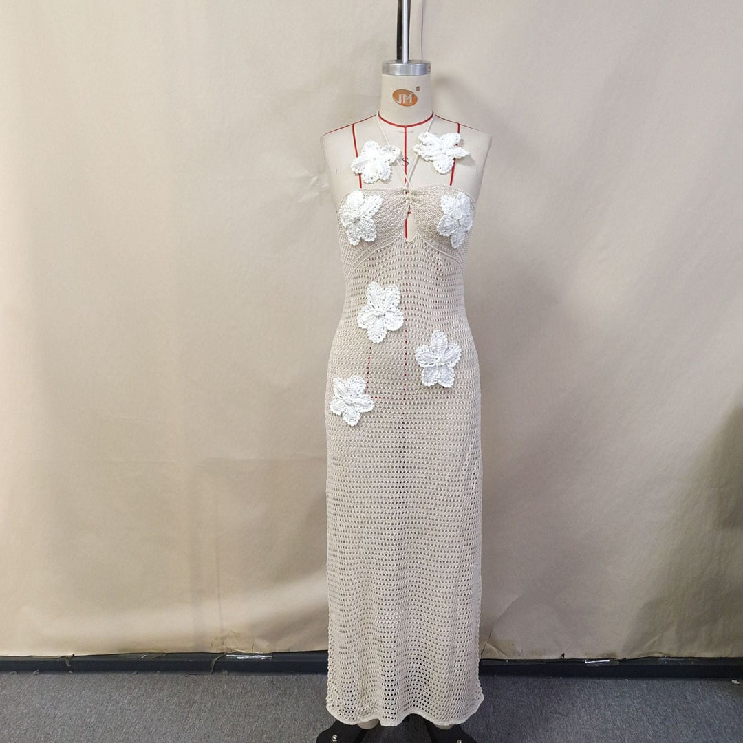 Natalia knitted beach maxi dress with a floral design and open back