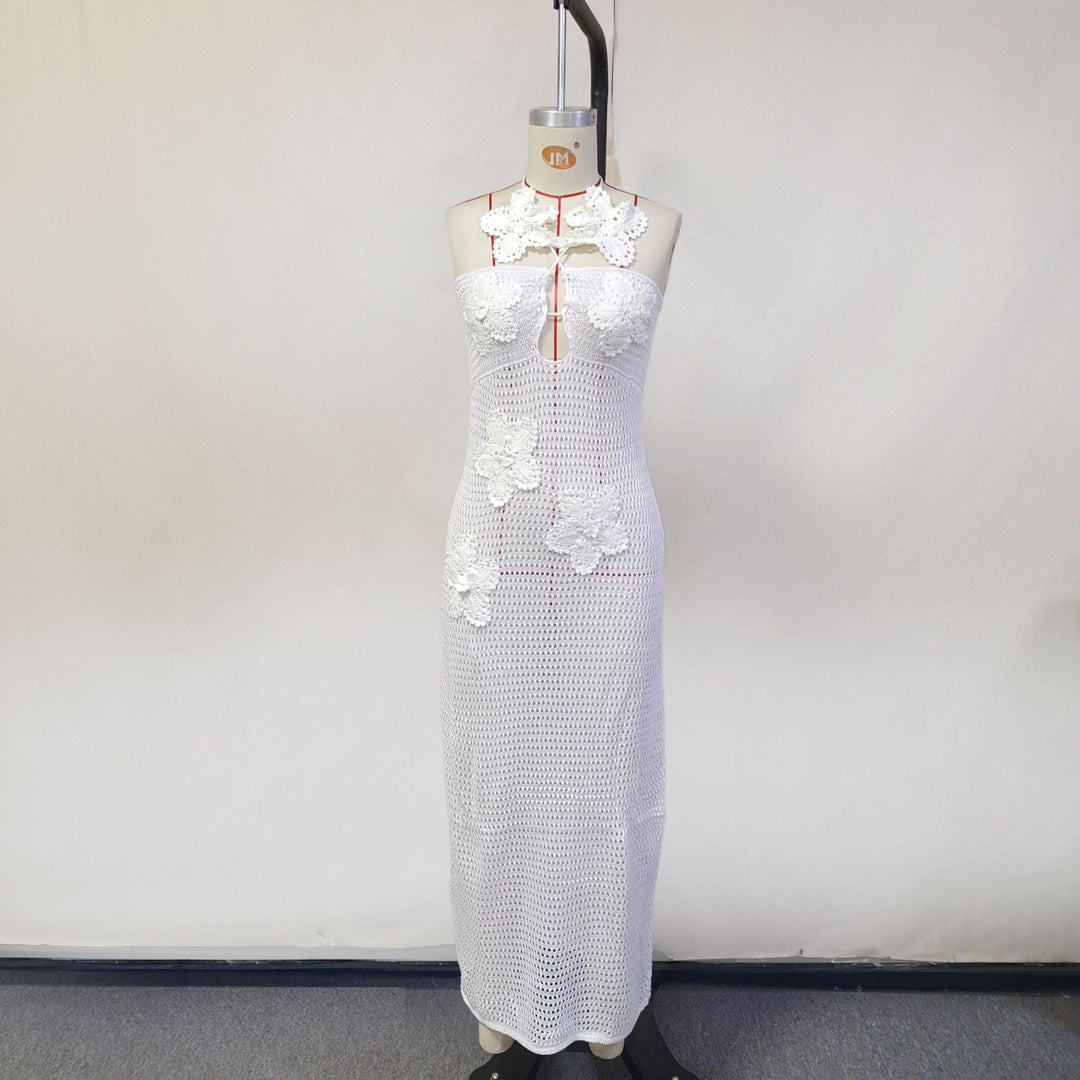 Natalia knitted beach maxi dress with a floral design and open back