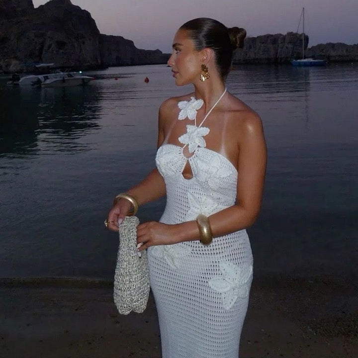 Natalia knitted beach maxi dress with a floral design and open back