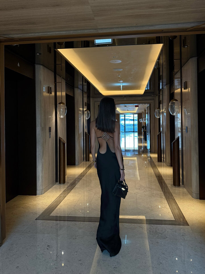 Roxania elegant satin maxi dress with a diamond buckle detail on the back