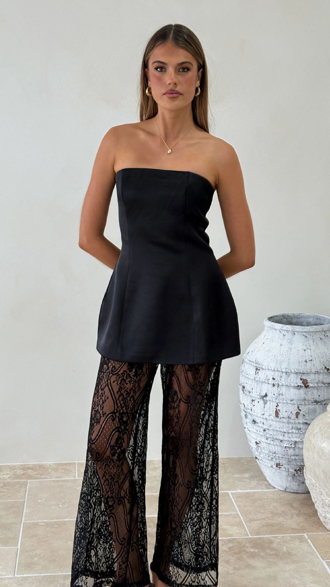 LYN two-piece set with a strapless satin top and lace pants