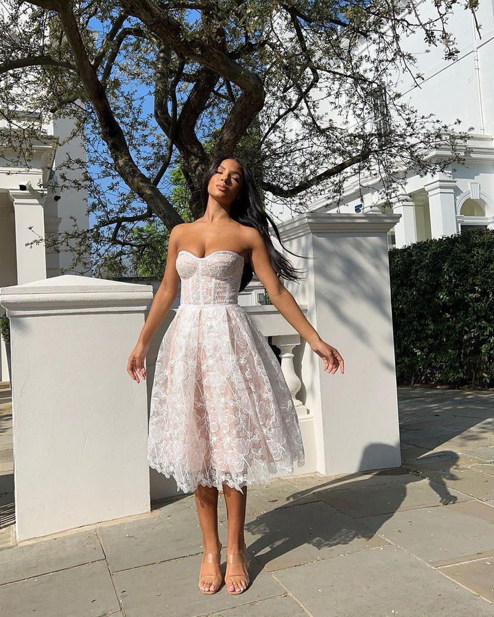 Rosalie strapless midi dress with a shiny floral embroidery design