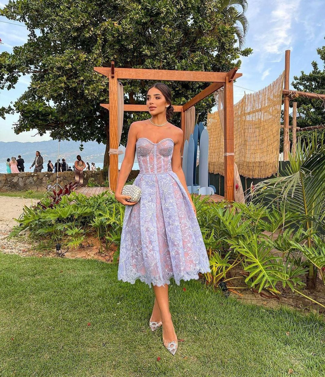 Rosalie strapless midi dress with a shiny floral embroidery design