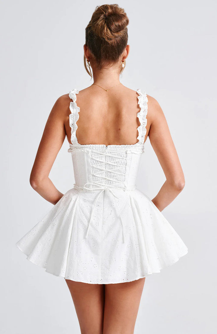 A-line mini dress in embroidered eyelet fabric with back ties for a fitted waist – Vנס