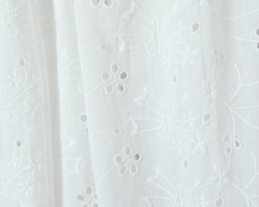 A-line mini dress in embroidered eyelet fabric with back ties for a fitted waist – Vנס