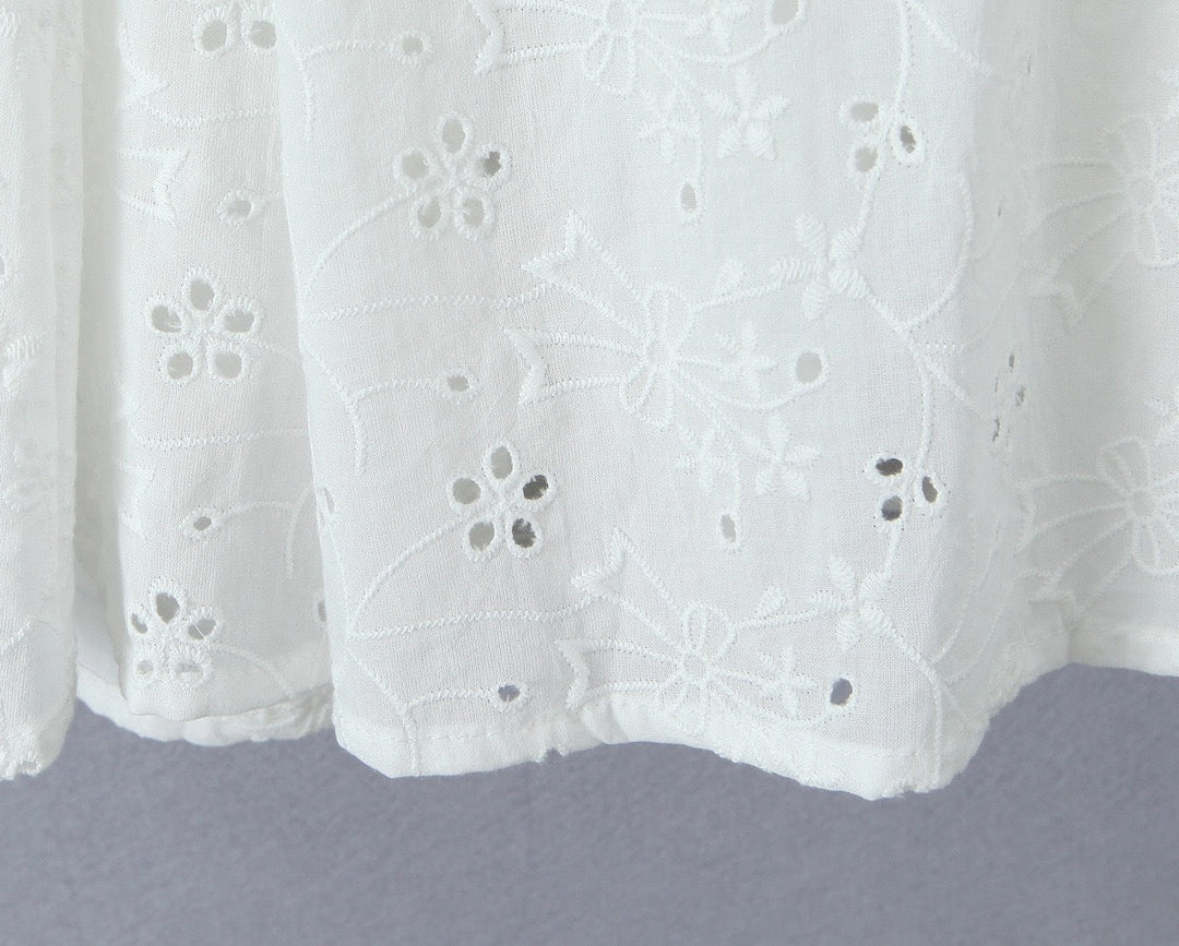 A-line mini dress in embroidered eyelet fabric with back ties for a fitted waist – Vנס