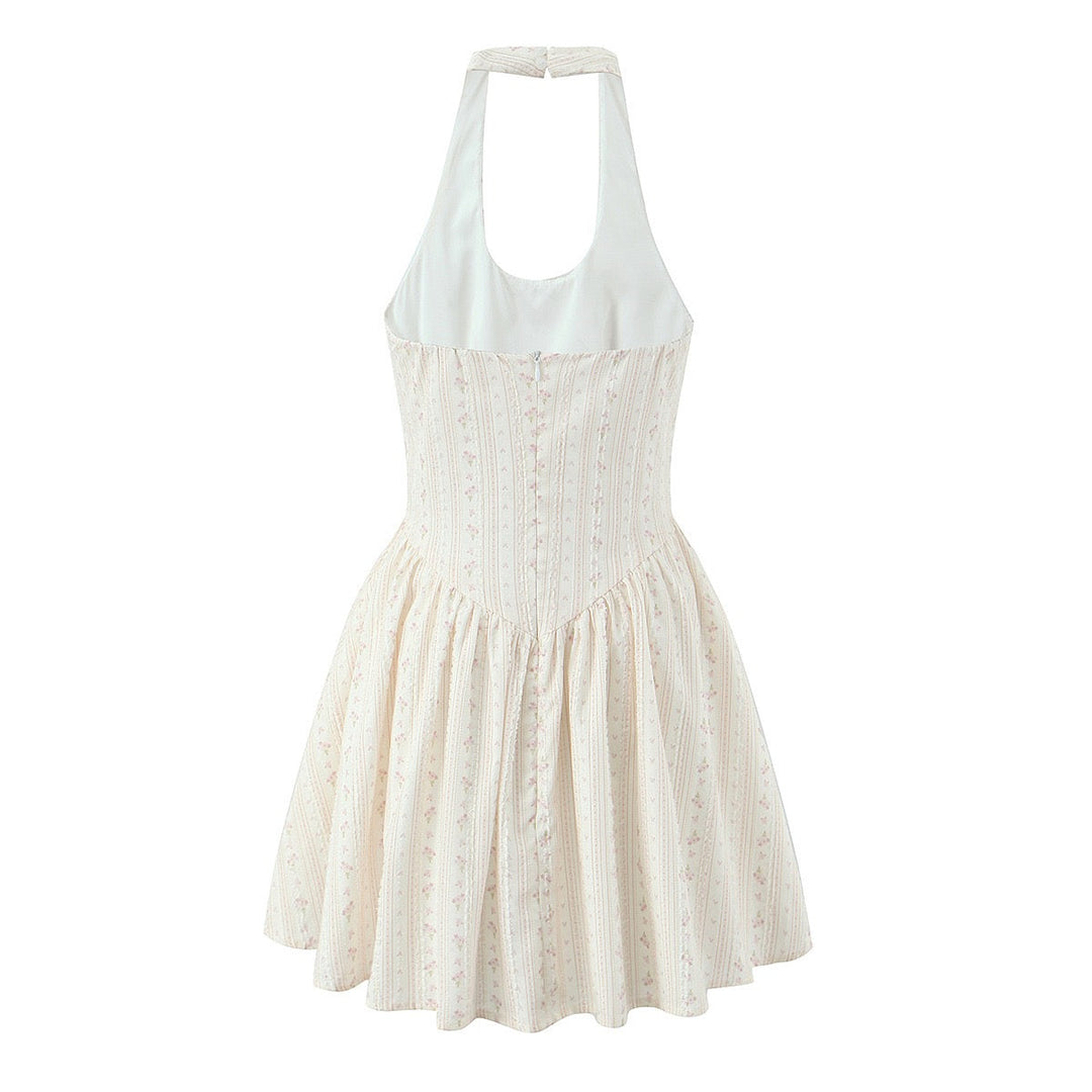Floral A-line mini dress with an open back – Nelly