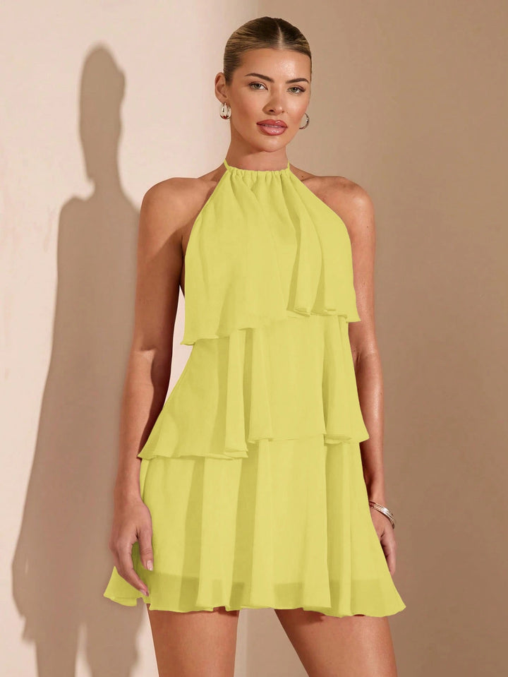 Milly tiered chiffon ruffle mini dress with a neck tie and open back