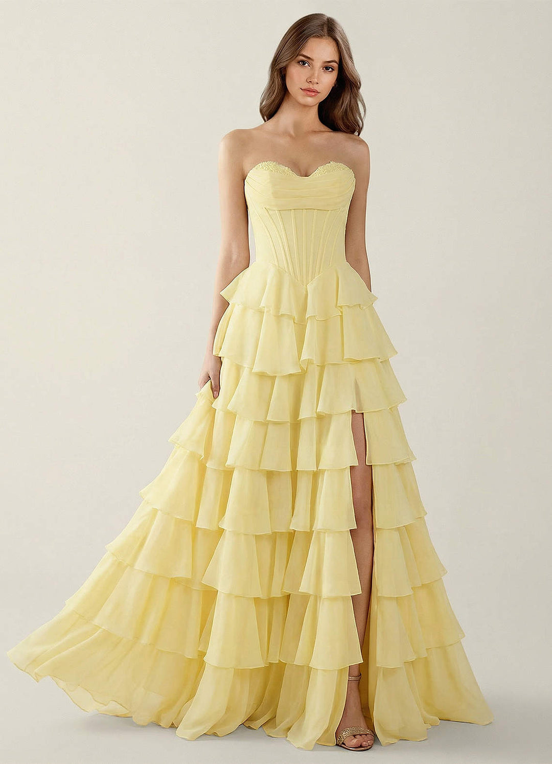 SHERY strapless ruffle maxi dress with a corset design, back tie, waist-cinching fit, and slit