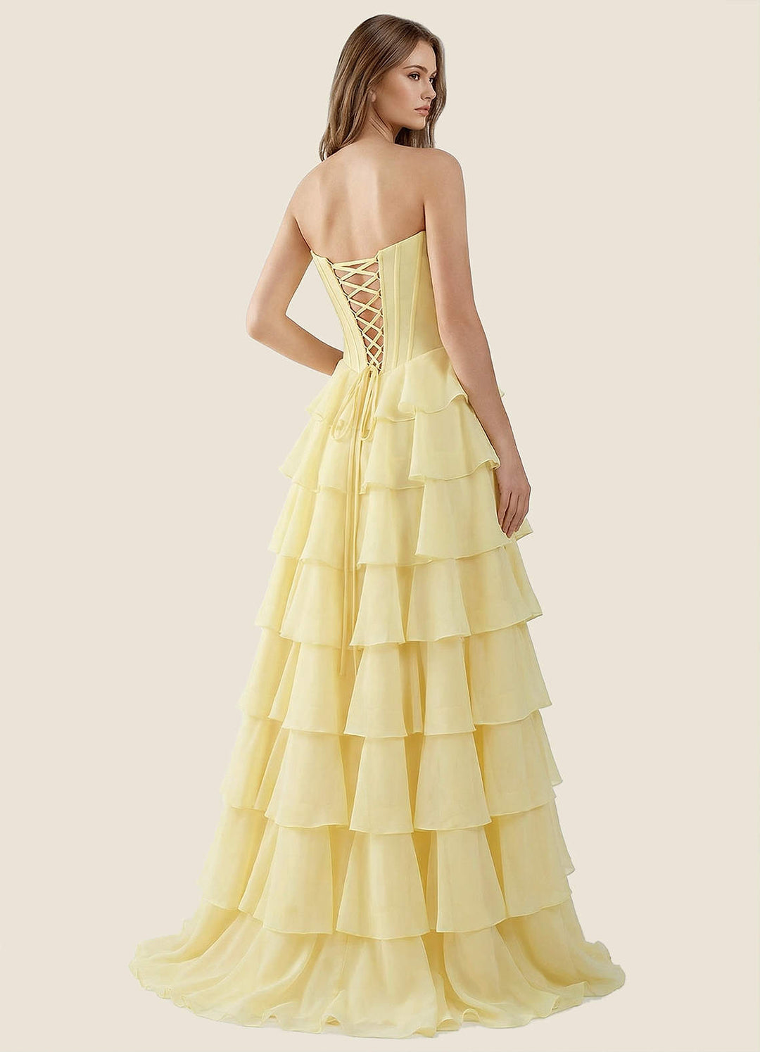 SHERY strapless ruffle maxi dress with a corset design, back tie, waist-cinching fit, and slit