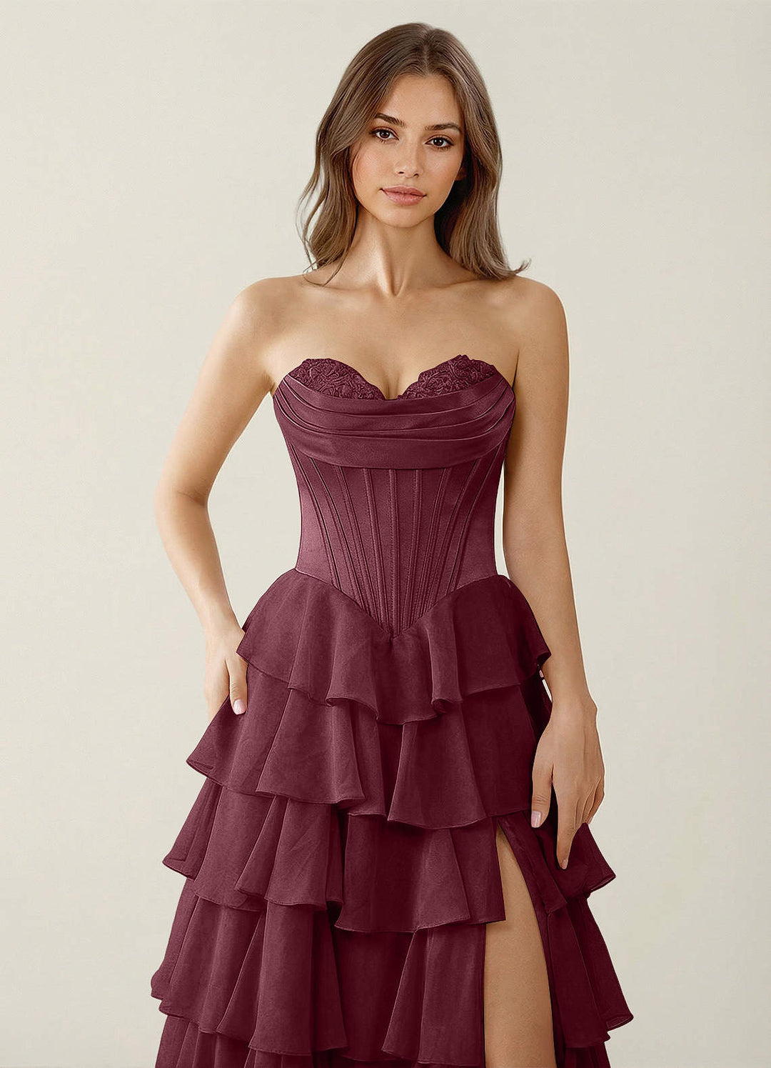 SHERY strapless ruffle maxi dress with a corset design, back tie, waist-cinching fit, and slit