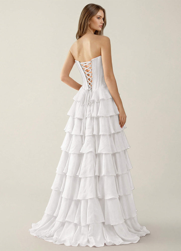 SHERY strapless ruffle maxi dress with a corset design, back tie, waist-cinching fit, and slit