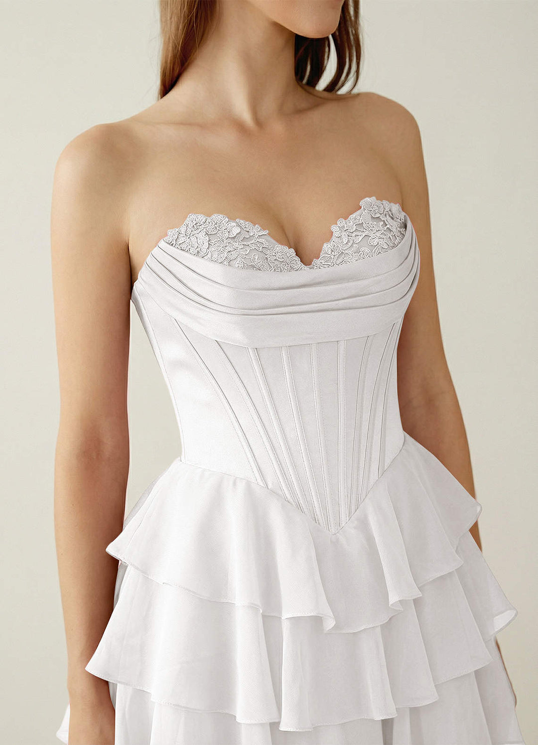 SHERY strapless ruffle maxi dress with a corset design, back tie, waist-cinching fit, and slit