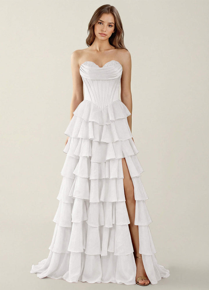 SHERY strapless ruffle maxi dress with a corset design, back tie, waist-cinching fit, and slit
