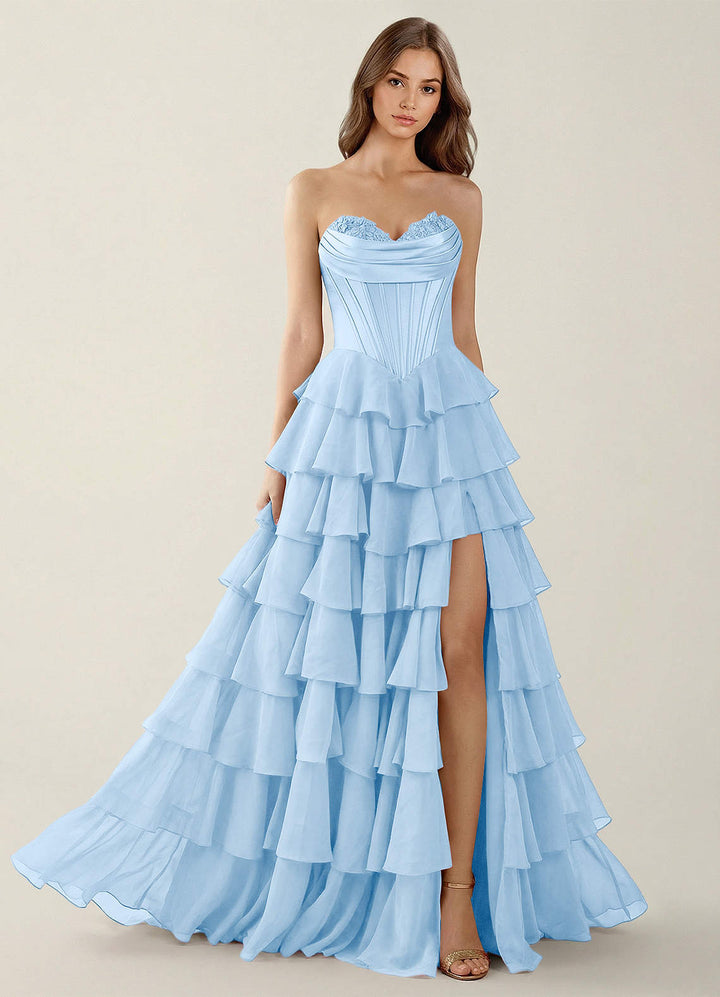 SHERY strapless ruffle maxi dress with a corset design, back tie, waist-cinching fit, and slit