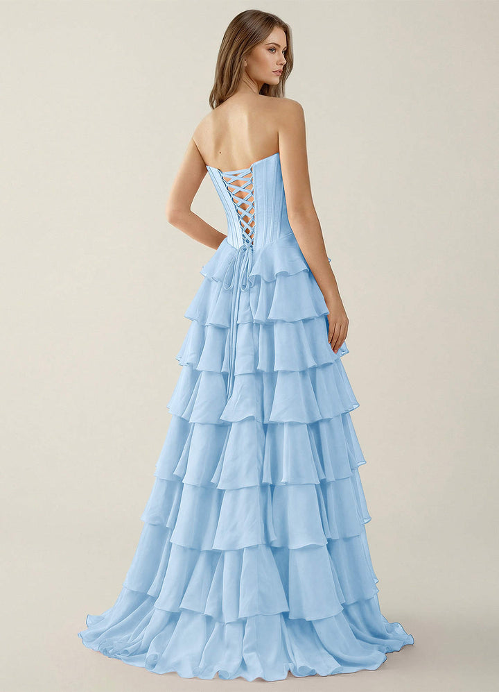 SHERY strapless ruffle maxi dress with a corset design, back tie, waist-cinching fit, and slit