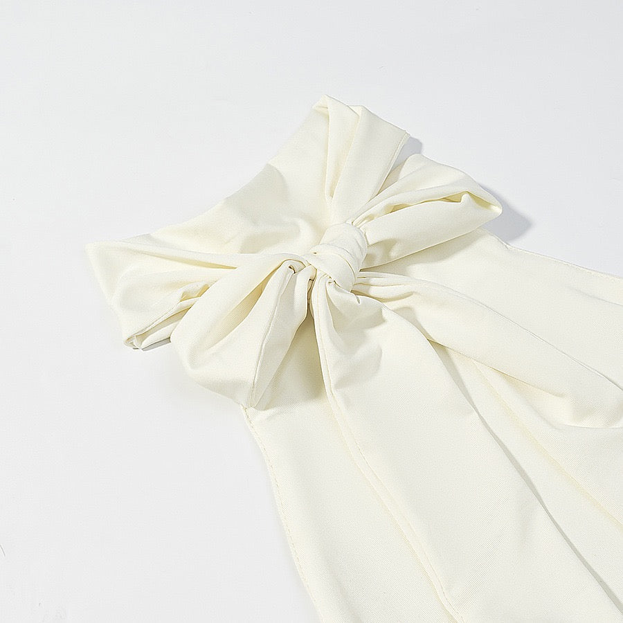 Tiered balloon mini dress with a turtleneck, neck ties, and an open back – DASSY