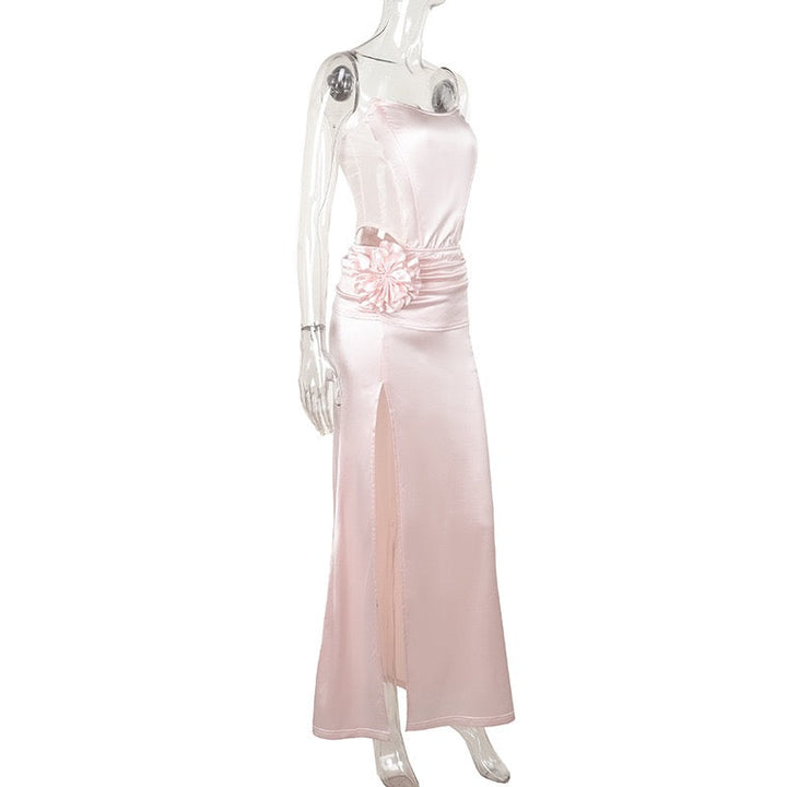 Strapless satin maxi dress with pleats and slit decorated with a flower - Joyce