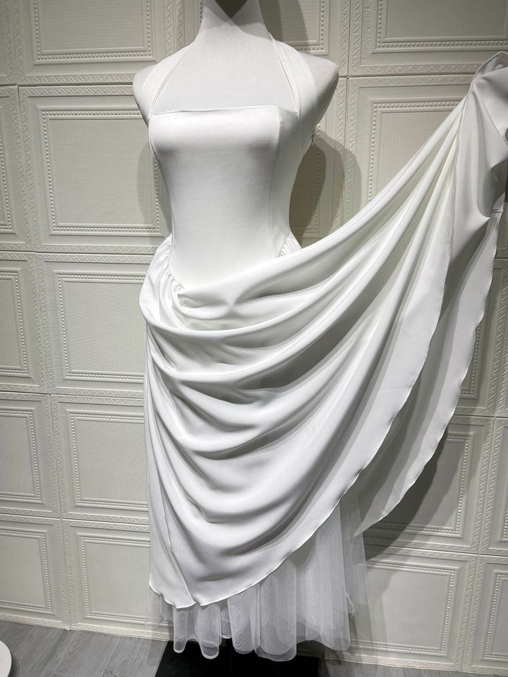 Marlene midi dress with a neck tie, open back, and tulle trim
