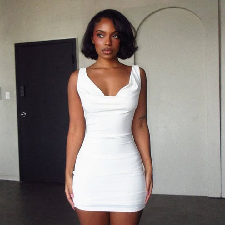 Mini dress with pleated design, open back, and stone chain decoration - SIA